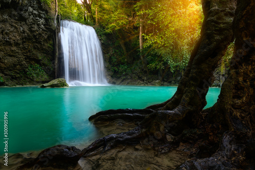 A beautiful waterfall deep in the tropical forest steep mountain adventure in the rainforest.