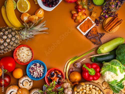 Mixed colorful foods as nuts  fruits  vegetables  beans  herbs  powders  contains antioxidants  vitamins  fiber. Immune boosting products. Healthy clean concept. Superfoods