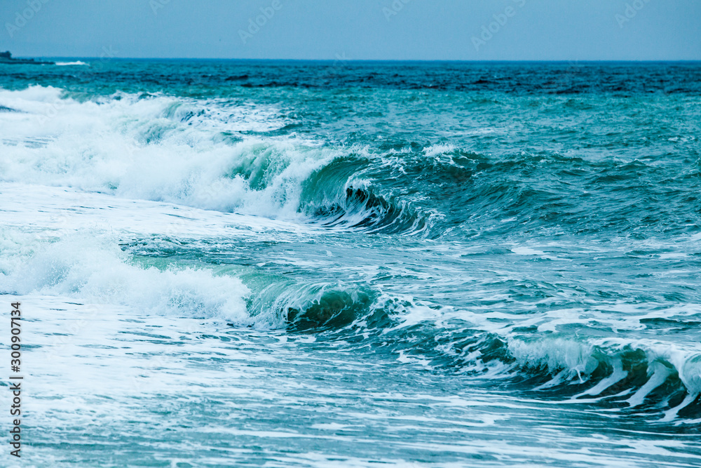Fototapeta premium waves on the surface of the blue sea