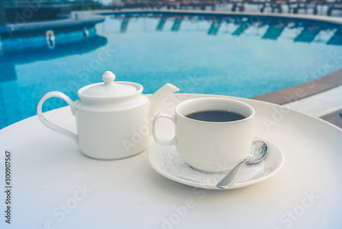 tea set on plate near spa pool
