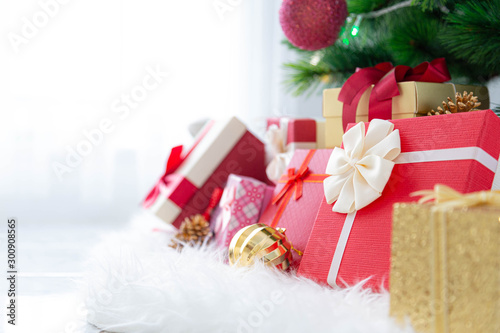 Christmas background with gift box and christmas decoration. © Satawat