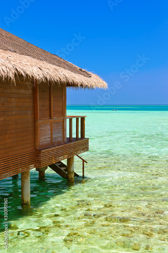 Fototapeta Naklejka Na Ścianę i Meble -  Water bungalows on tropical Maldives island