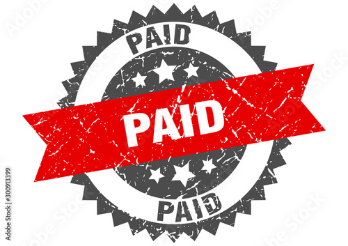 paid grunge stamp with red band. paid