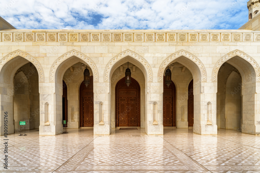 Arched gates and carved doors, the Sultan Qaboos Grand Mosque