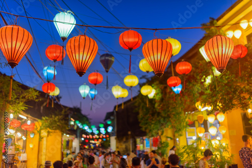 Awesome evening view of street decorated with lanterns, Hoi An