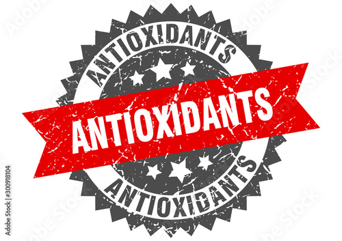 antioxidants grunge stamp with red band. antioxidants