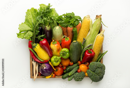 Healthy harvest of vegetables in organic wooden box