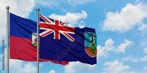 Φωτογραφία Haiti and Montserrat flag waving in the wind against white cloudy blue sky together