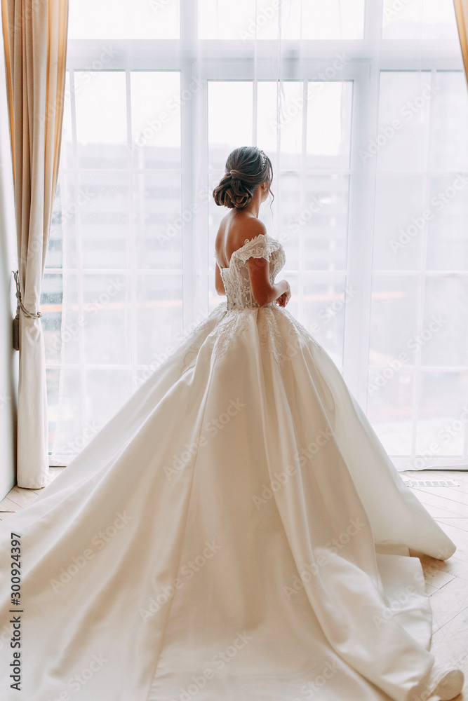 European-style wedding at the hotel. Bride in a white dress in the interior Studio. European-style wedding at the hotel. Bride in a white dress in the interior Studio.