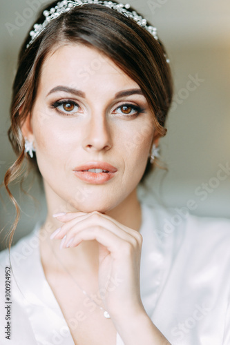 Girl in boudoir dress in European style. Morning bride in the interior Studio.