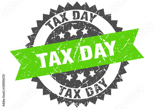 tax day grunge stamp with green band. tax day