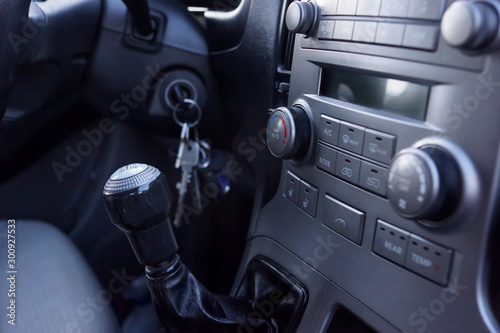 shift lever and middle console of the car © Elena