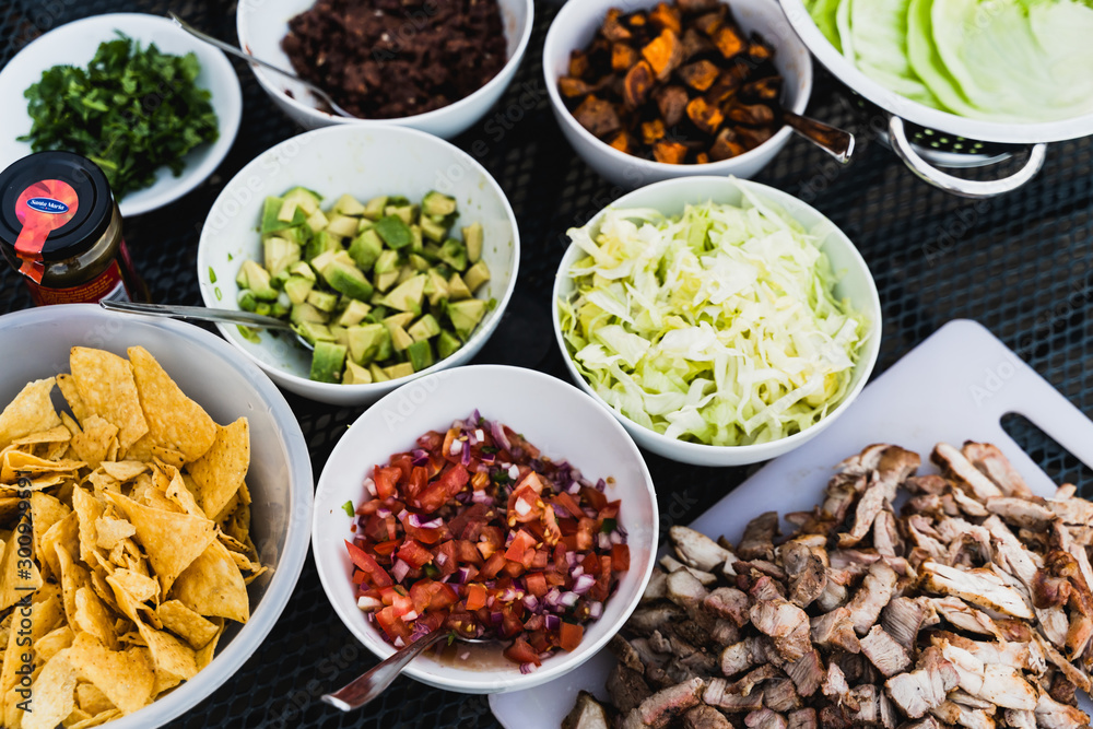 BBQ mexican salad selection in bowls summer