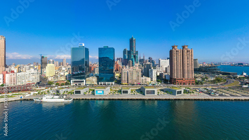 Aerial view Kaohsiung city with blue sky background and Kaohsiung harbor, Taiwan.