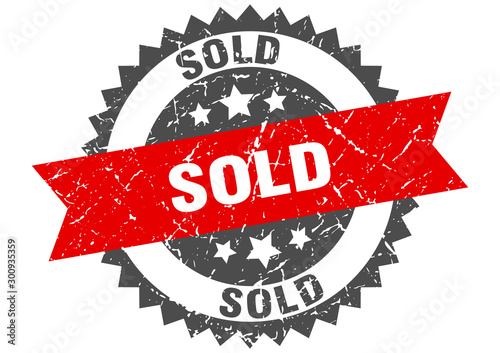 sold grunge stamp with red band. sold