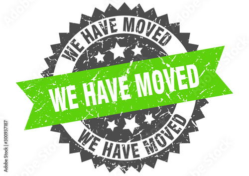 we have moved grunge stamp with green band. we have moved