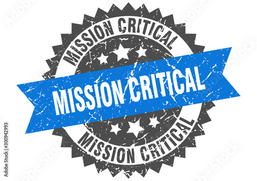 mission critical grunge stamp with blue band. mission critical