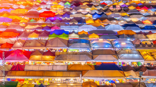Fotografie Train night market Ratchada during twilight sky