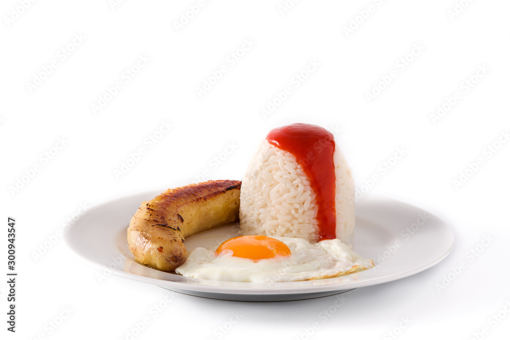 Arroz a la cubana.Typical Cuban rice with fried banana and fried egg on a plate Arroz a la cubana.Typical Cuban rice with fried banana and fried egg on a plate