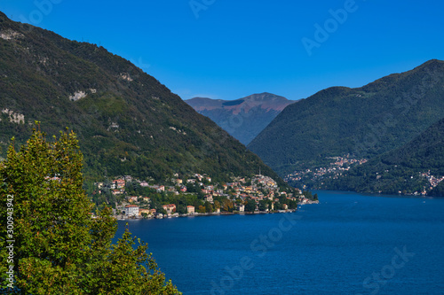Panoramic view of Lake Como. Lombardy, Italy. Autumn season. Perfect clear blue sky. © Berg