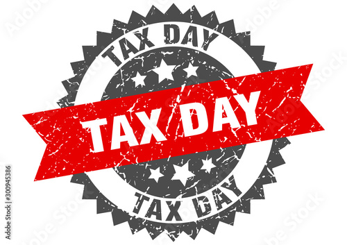 tax day grunge stamp with red band. tax day