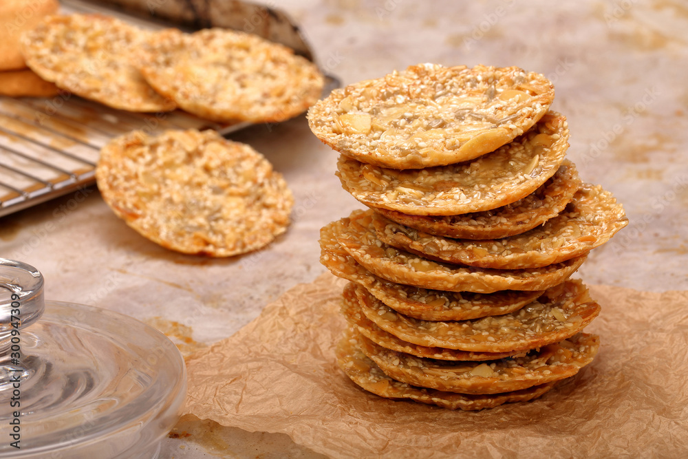 Crunchy cookies with sesame, closeup of cakes in the bakery Crunchy cookies with sesame, closeup of cakes in the bakery