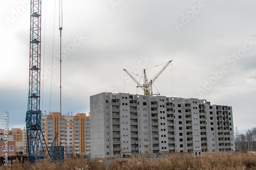 Tablou pe pânză construction cranes on the construction site new residential area