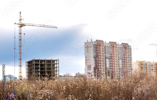 Foto construction cranes on the construction site new residential area