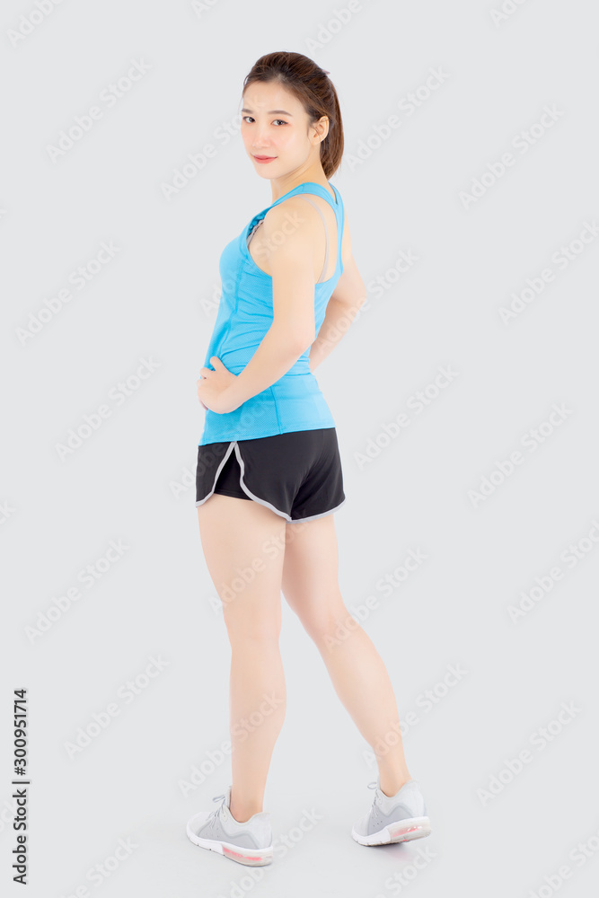 Beautiful portrait young asian woman in sport clothes with satisfied and confident isolated on white background, asia girl cheerful have shape and wellness, exercise for fit with health concept. Beautiful portrait young asian woman in sport clothes with satisfied and confident isolated on white background, asia girl cheerful have shape and wellness, exercise for fit with health concept.