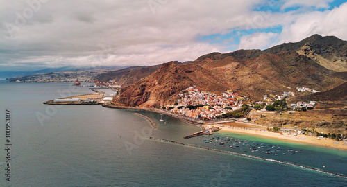 Aerial photography drone point of view of Playa de Las Teresitas beach picturesque distant view of mountainous terrain bright colors Atlantic Ocean, Santa Cruz de Tenerife, Canary Islands, Spain