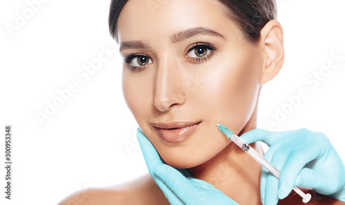 beautiful woman received procedure lifting skin. Injections Botulinum toxin for remove wrinkle isolated on white