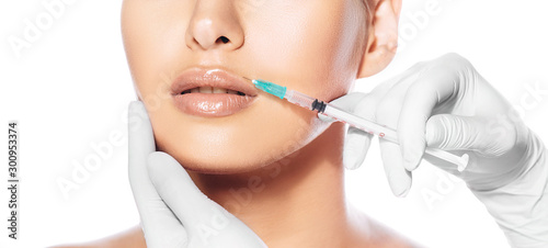 Εκτύπωση καμβά Cropped female face during lip augmentation procedure