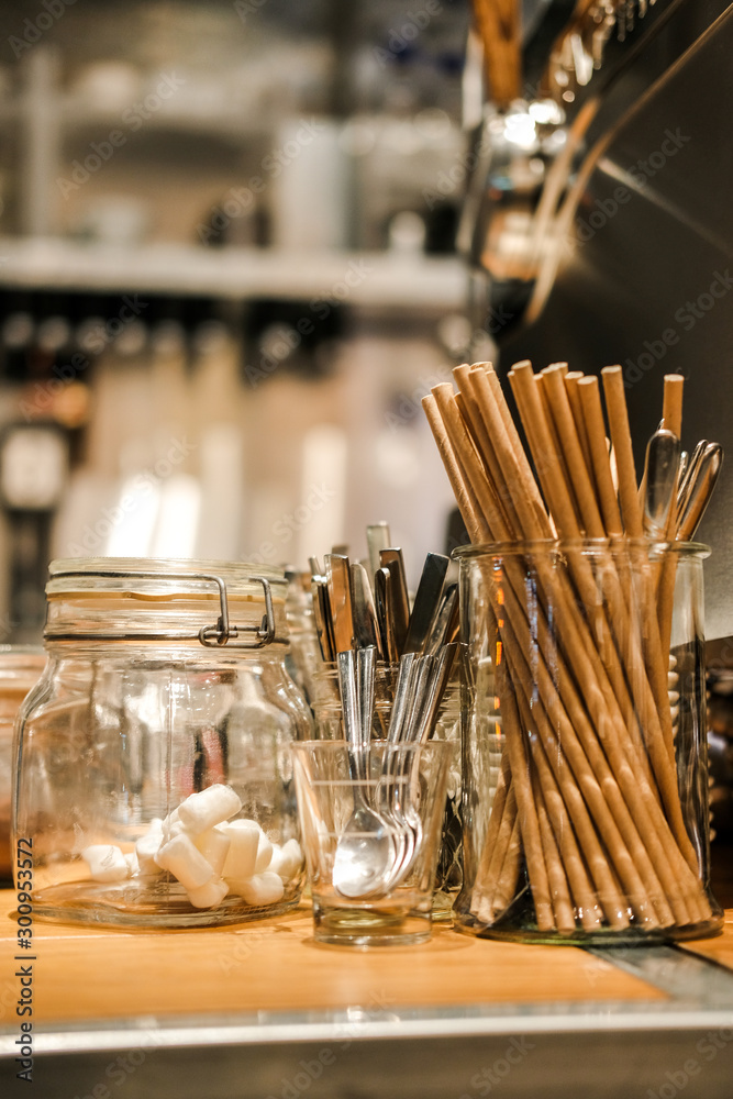 Coffee shop interior design with cups spoons and kitchen details Coffee shop interior design with cups spoons and kitchen details