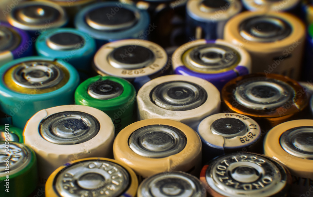 Group of used disposable drain batteries of various size Group of used disposable drain batteries of various size