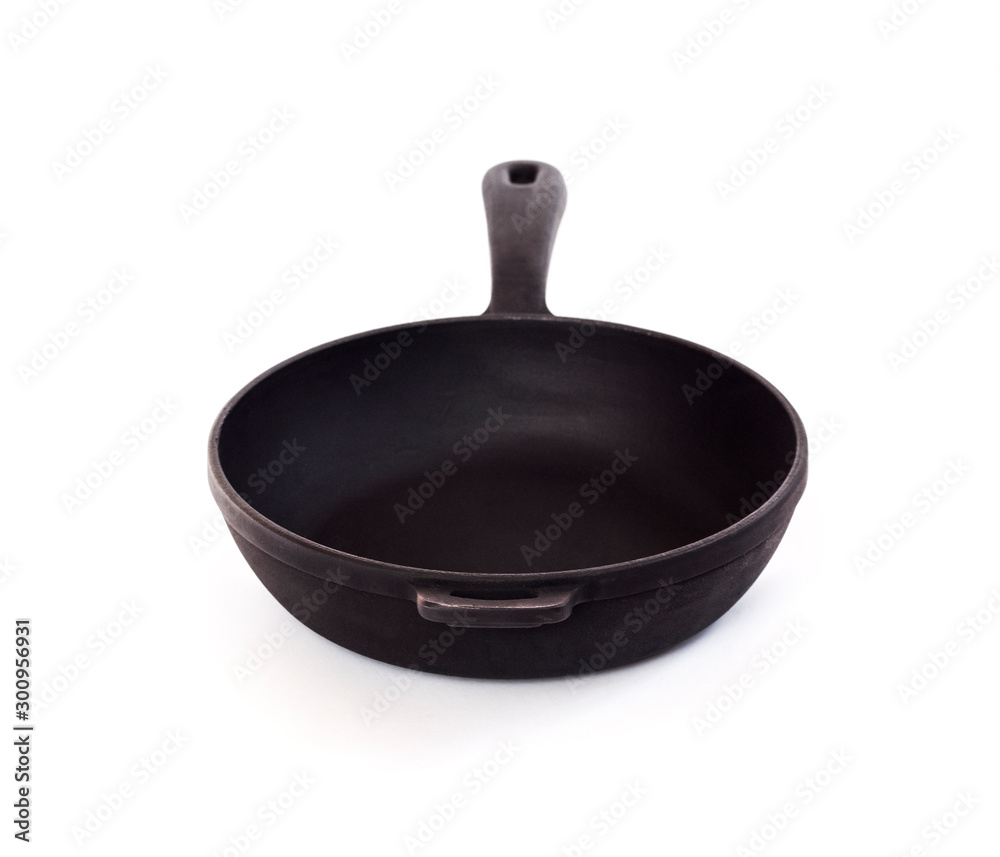 Fototapeta premium Cast iron pan isolated on white background