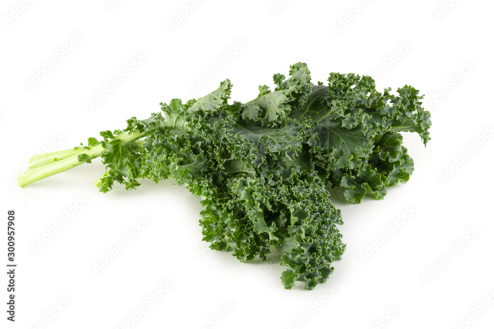 Fresh organic green kale leaves isolated over white background Fresh organic green kale leaves isolated over white background