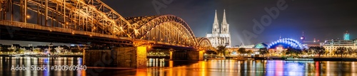 Panorama of the city of Cologne at night with Cologne Cathedral, Hohenzollern Bridge and Rhine river © Günter Albers