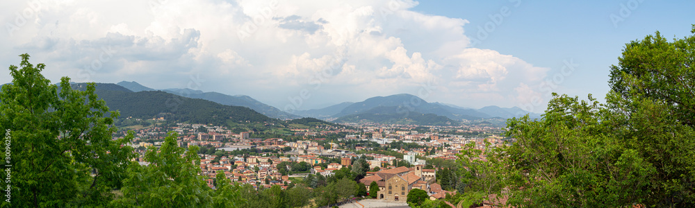Beautiful buildings on the hills. Bergamo. Beautiful,  panoramic view. Journey to Italy. Green Summer Landscape. 