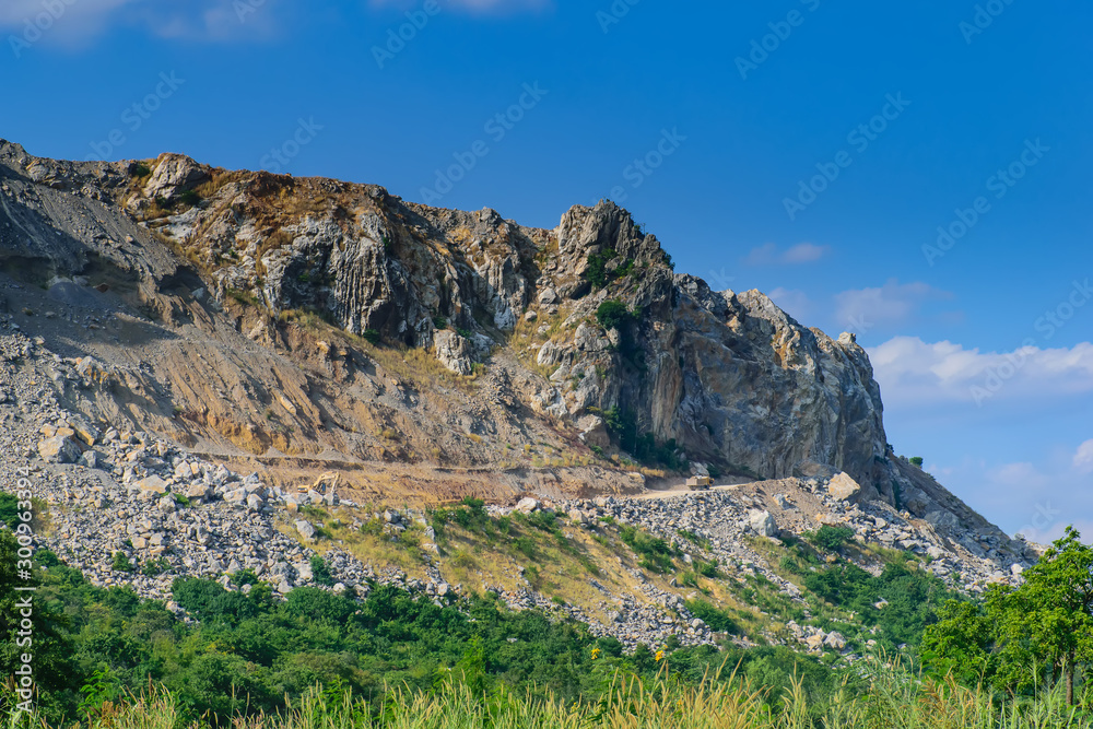 Top of rock mountain.High mountain cliffs with blue sky in Thailand.