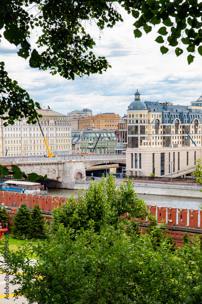 View from the Moscow Kremlin to the embankment of the Moscow River, Bolshoy Moskvoretsky Bridge under restoration and the Central Bank of Russia General Directorate for the Central Federal District