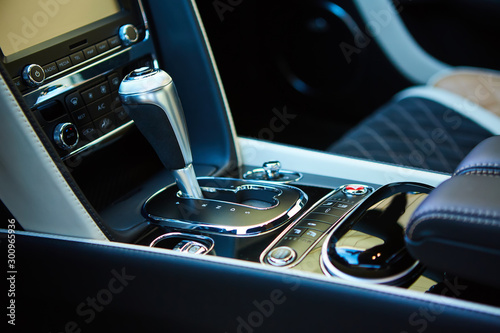 Detail of modern car interior, gear stick.