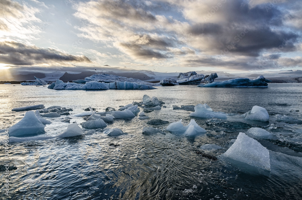 Icebergs in fantastic Jokulsarlon glacial lagoon on sunset. Southeast Iceland, Europe. Fantastic Landscape