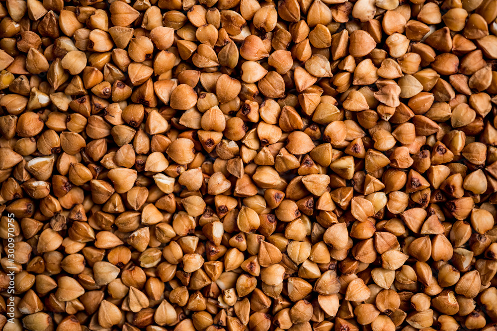 The texture of dry buckwheat. Background image of buckwheat porridge. Maro's Photo The texture of dry buckwheat. Background image of buckwheat porridge. Maro's Photo