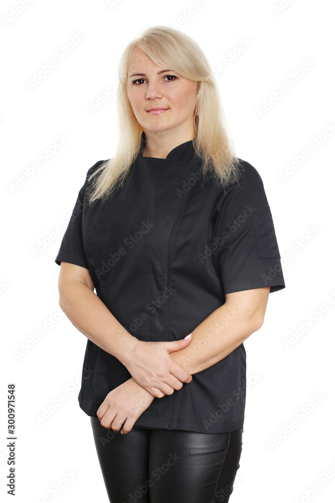Portrait of young woman chef in black uniform Portrait of young woman chef in black uniform