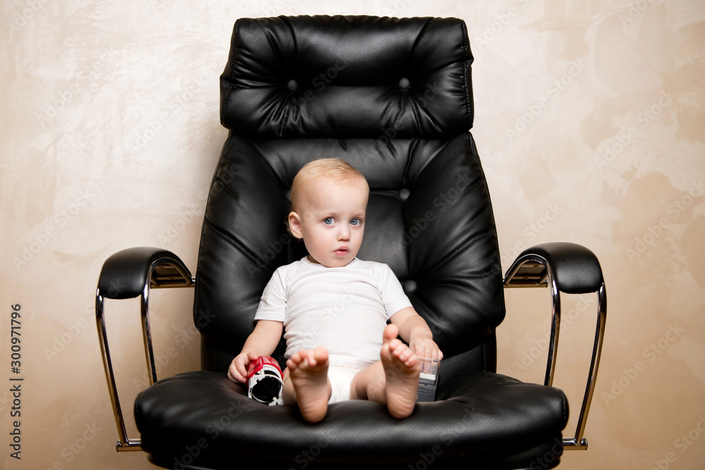 child, office leather chair and text stamps Stock Photo | Adobe Stock