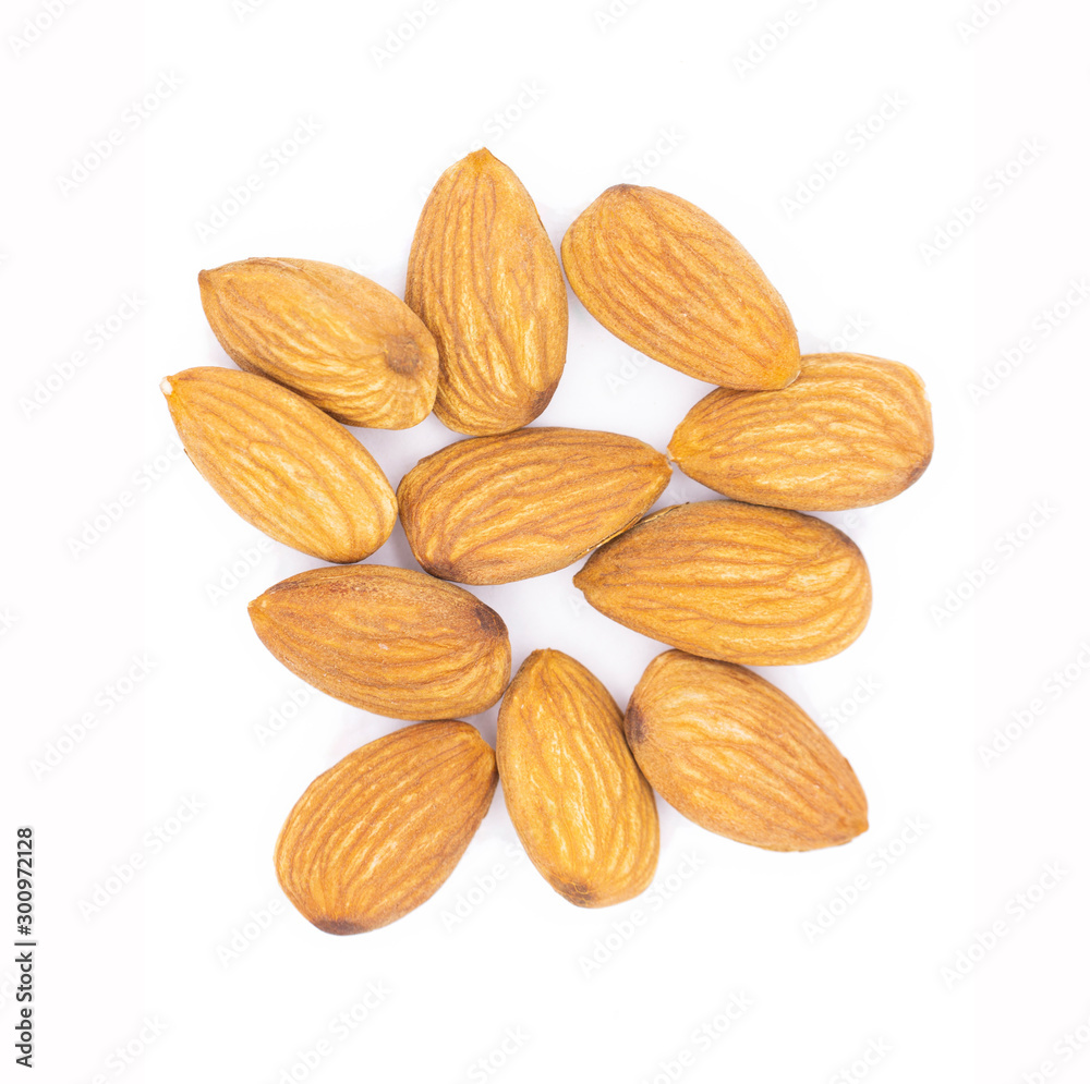 Almonds isolated on white background. A bunch of dried nuts Almonds isolated on white background. A bunch of dried nuts