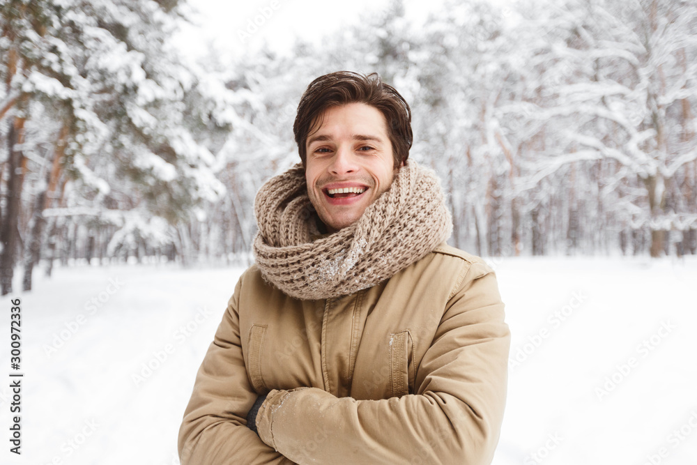 Guy Smiling At Camera Crossing Hands Standing In Winter Forest Guy Smiling At Camera Crossing Hands Standing In Winter Forest