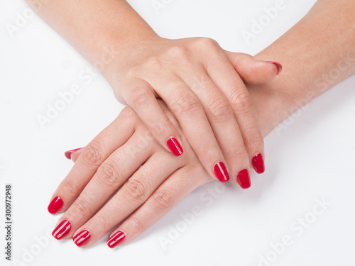 Woman s hands with red manicure
