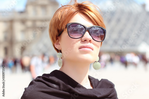 Beautiful young woman in Paris, France.