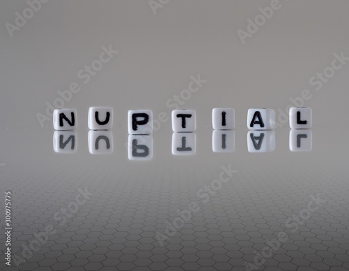 The concept of nuptial represented by wooden letter tiles